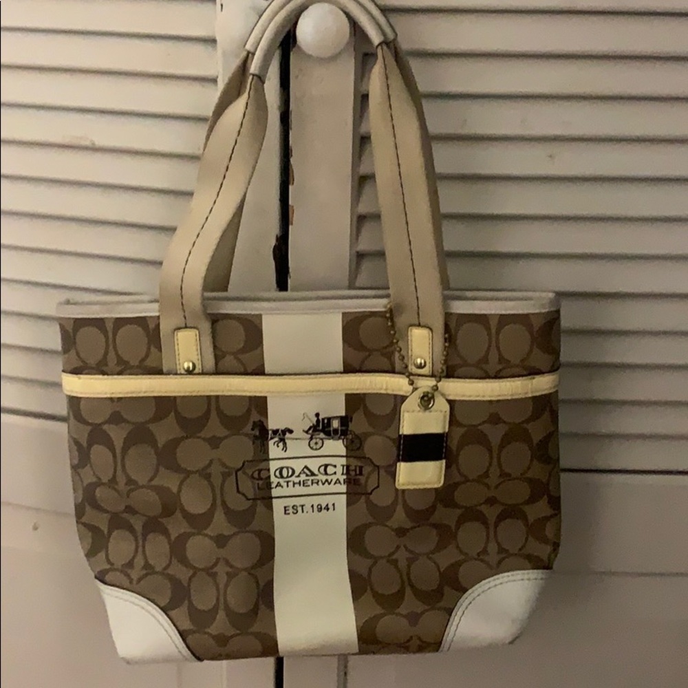 Coach handbag.  Plaid interior.  Approx 12 x 12.